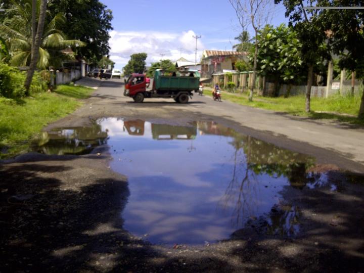 Tips Berkendara Saat Melewati Genangan Air