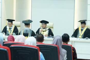 Deny Rolind Zabara Sukses Meraih Gelar Doktor dalam Ilmu Ekonomi