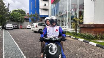 Simak Lima Tips Cari_Aman saat Berboncengan dengan Sepeda Motor